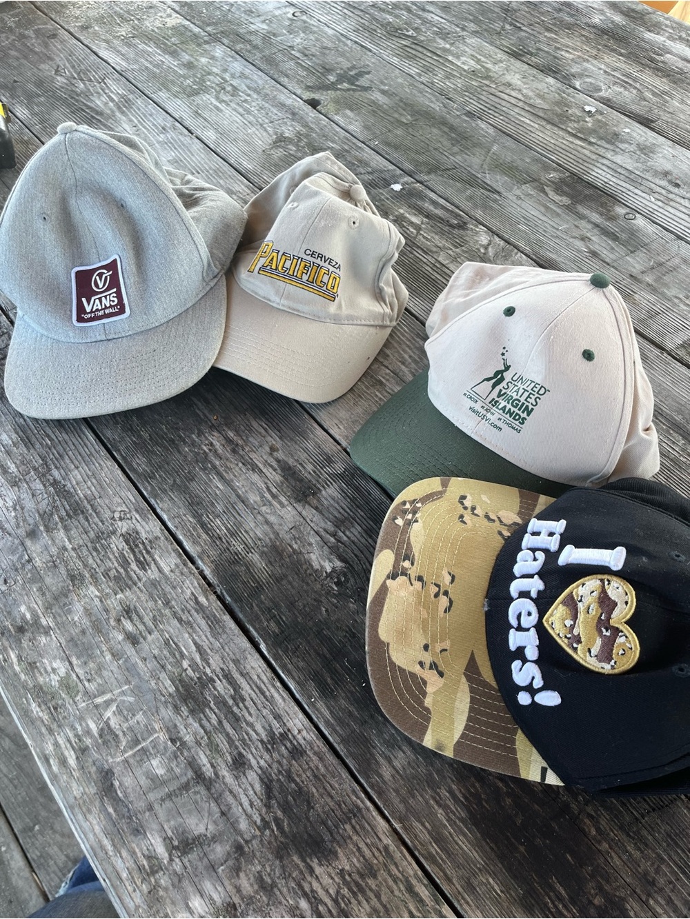 Four trucker hats